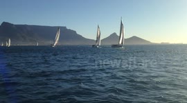 Lovely Table Mountain filmed from Table Bay with smiling girl