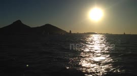 Sunset over Lion's head in Cape Town and then a panning over to Table Mountain