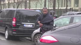 Kanye West attending 2014 Balenciaga fashion show in Paris