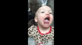 Baby tries to eat door!
