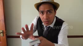 Magician performs interactive video trick