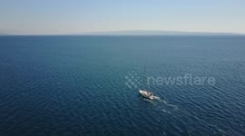 Sailboat crosing 4K drone footage