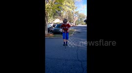 Newsflare Edit - Youngster uses skipping rope while bouncing on a pogo stick