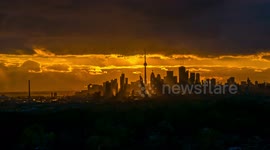 High definition time-lapse of the sun setting behind Toronto