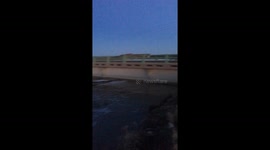Water touching bottom of bridge