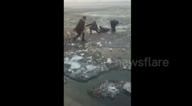 Good samaritans rescue boys trapped in icy river