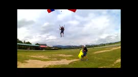 Skydiver lands on another skydiver during botched landing