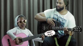 Rock Star 5-Year-Old Playing Her first Guitar Chords Like a Pro