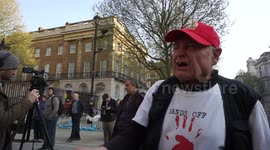 Activist alleges Donald Trump is a War Criminal protests No to Trump's attack on Syria