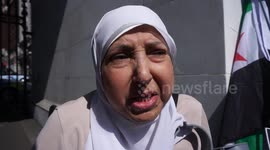 A Syrian ladies begs Trump to bombs Assad palace at the London Against Chemical Warfare in Syria,UK
