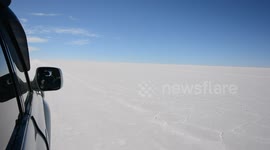 Driving on the Salar de Uyuni in Bolivia