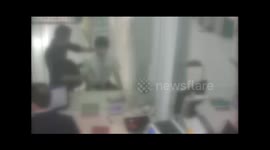 Brave bank worker offers himself as a hostage to save customer during robbery