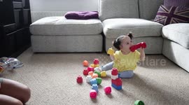 Baby girl looks like Boo from Monsters, Inc.