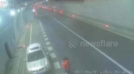 Daredevil woman shows off dancing moves for pictures on road