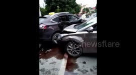 Car smashes vehicles after driver pressed accelerator by mistake