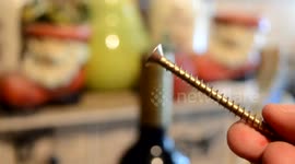 How to open a bottle of wine without a corkscrew