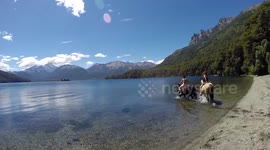 Fall down while riding a wild horse into the water in Patagonia Argentina. Scene 1 with GoPro