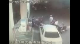Car crashes into six vehicles at petrol station in southern China