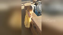 Newsflare Edit - Little girl makes fountain wish for Disneyland