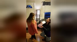 Woman surprises stepmother with adoption papers