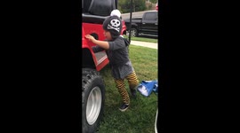 Cute Toddler Scares Himself Honking Horn.  Funny!!!