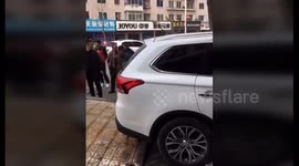 Driver presses accelerator by mistake and ploughs into police officer