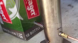 Cold smoking chicken in a cardboard  beer box
