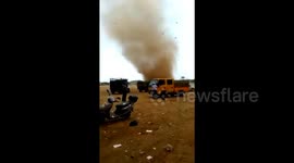 Dust devil rips through market in southern China