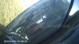 Dashcam footage captures moment semi-trailer is blown over by strong winds