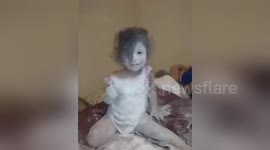 Cute toddlers cover themselves in baby powder