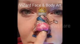 The Queen twerks on nose painting