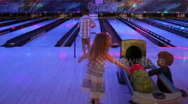 Dylan dances at the bowling alley