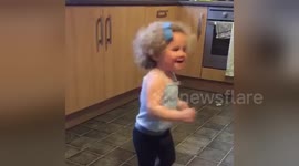 Toddler's funky dance to Bruno Mars sends her falling out of room
