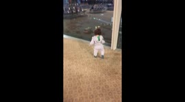 An infant walk happily in Airport