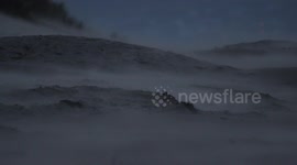 Fast Blowing Sand On N. Ireland Beach As Arctic Winds Hit UK