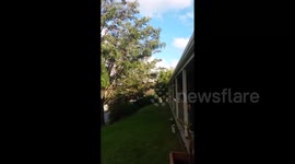 Slow motion bottle rocket