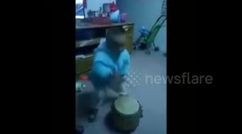 Chinese toddler shows off impressive drumming skills