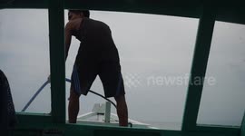 Indonesian Boat Driver