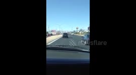 Car crashes into cars at red light