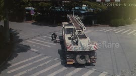 Mother and child narrowly escape being run over by crane