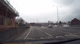 Impatient driver nearly takes out cyclist trying to get round anither car