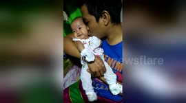 Newsflare Edit - Baby's reaction to Daddy's kiss Part 2