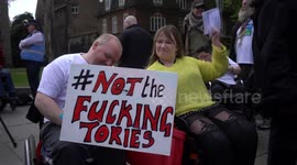 Disability rights activists gather outside Conservative Headquarters