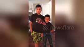 Sibling boys forced to wear same T-shirt because they keep fighting