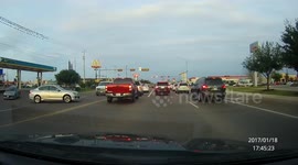 Lady driver blocks traffic