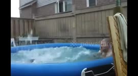 Grown man belly flops into kiddy pool.. this can't end well.