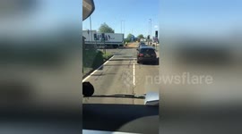 Thousands of potatoes spill out of lorry in Cheshire, UK