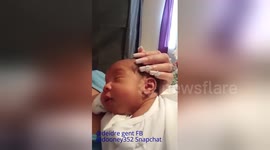 Adorable baby loves head rubs