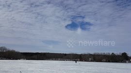 Invisible UFO punching through clouds !?