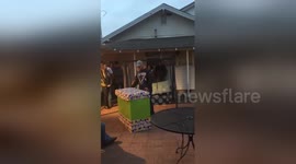 Daughter surprises stepdad with official adoption papers